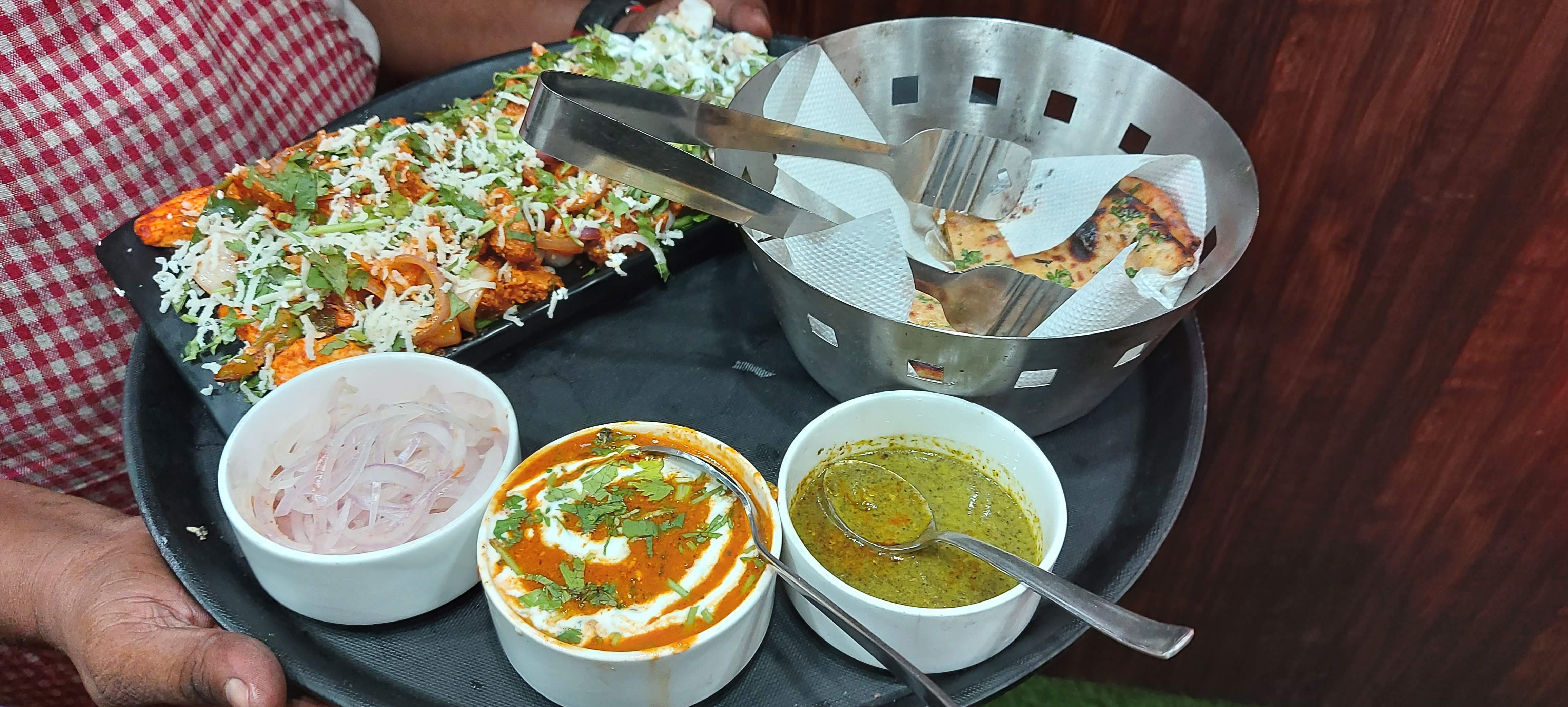 Restaurant style vegetable biryani with herbs and vegetables